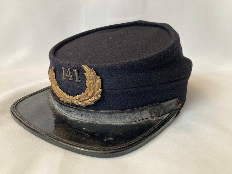 A Man, His Hat, And What We Can't Know